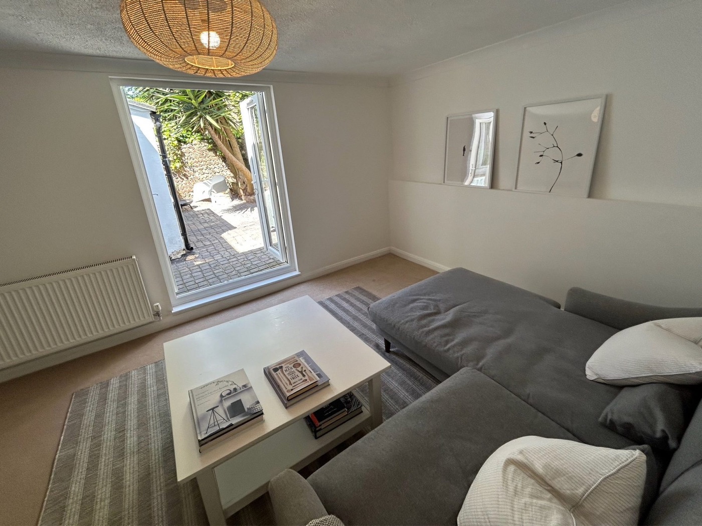 Rear sitting room opening directly onto the private patio