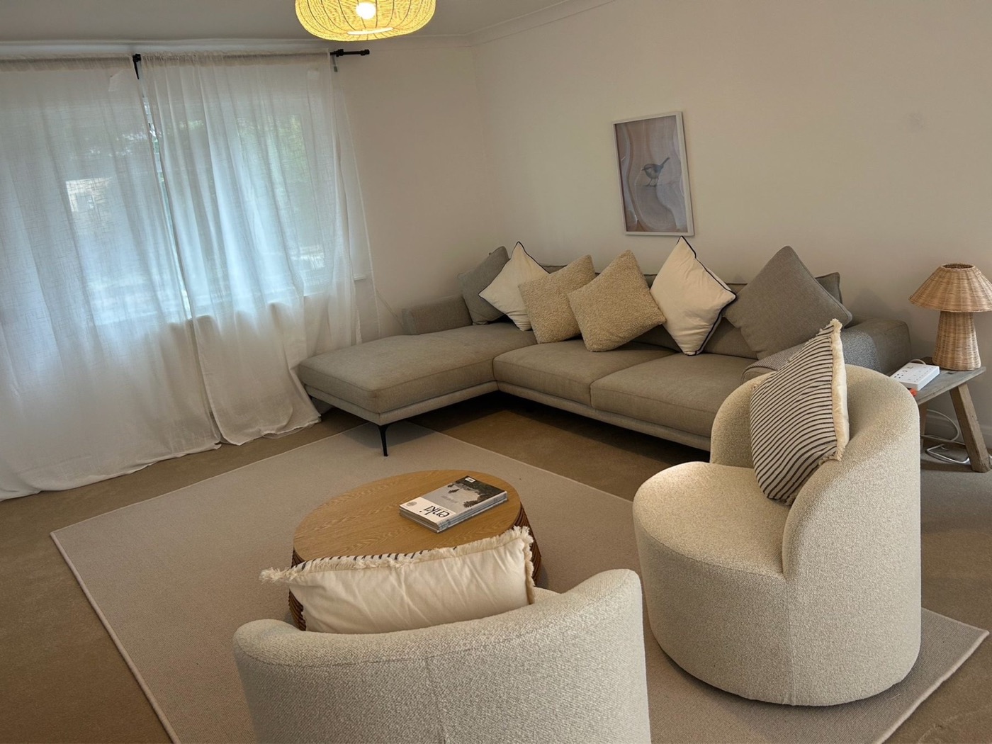 Generous, light-filled living room at The Coach House